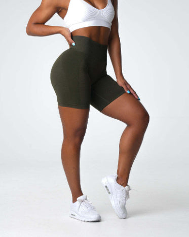 Legging cortos ajustados sin costuras para levantamiento de cadera y línea muscular de glúteos