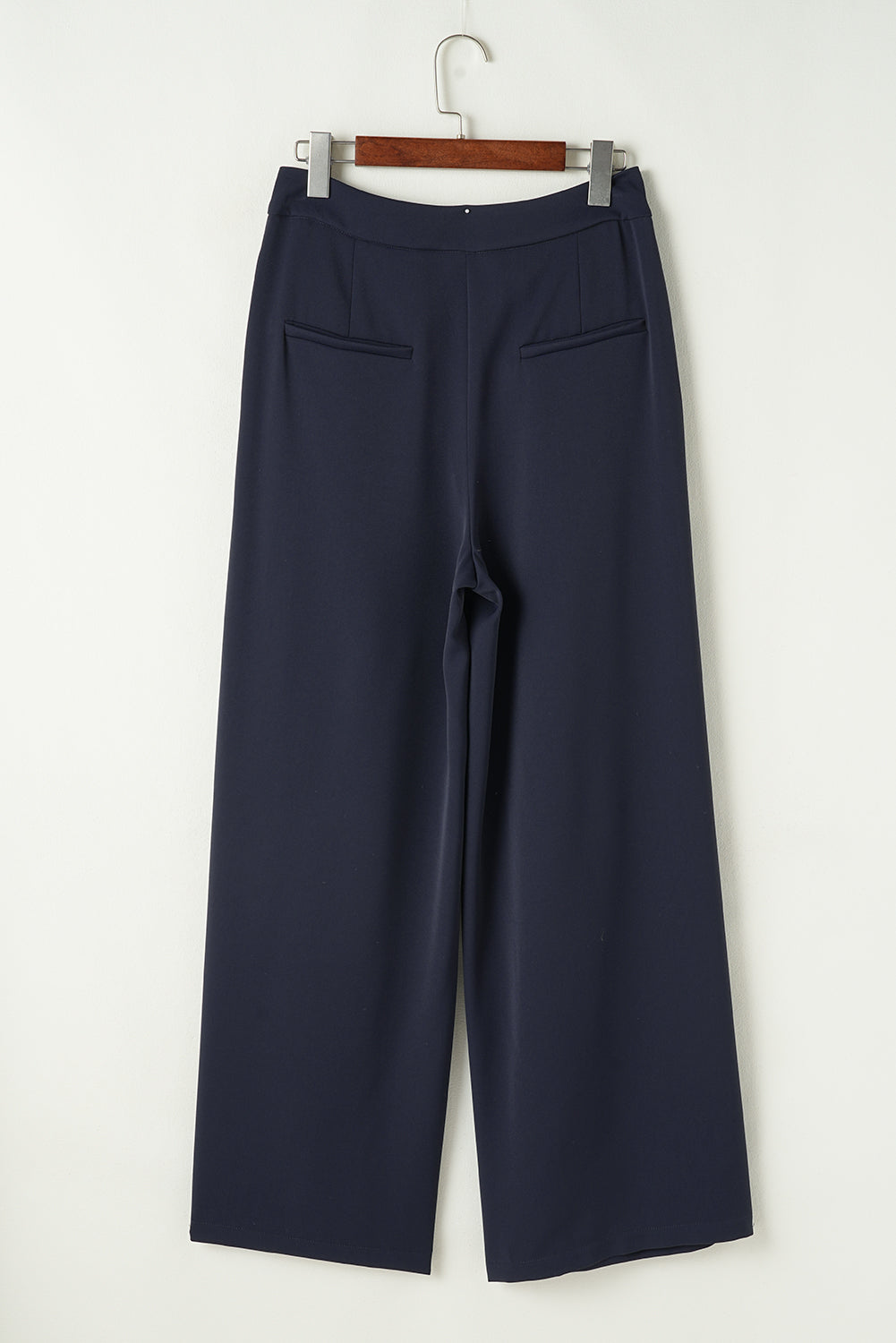 Pantalones anchos plisados de cintura alta con dos botones en azul sucio