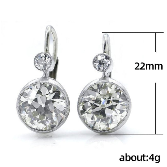 Pendientes de mujer elegantes con zirconias redondas