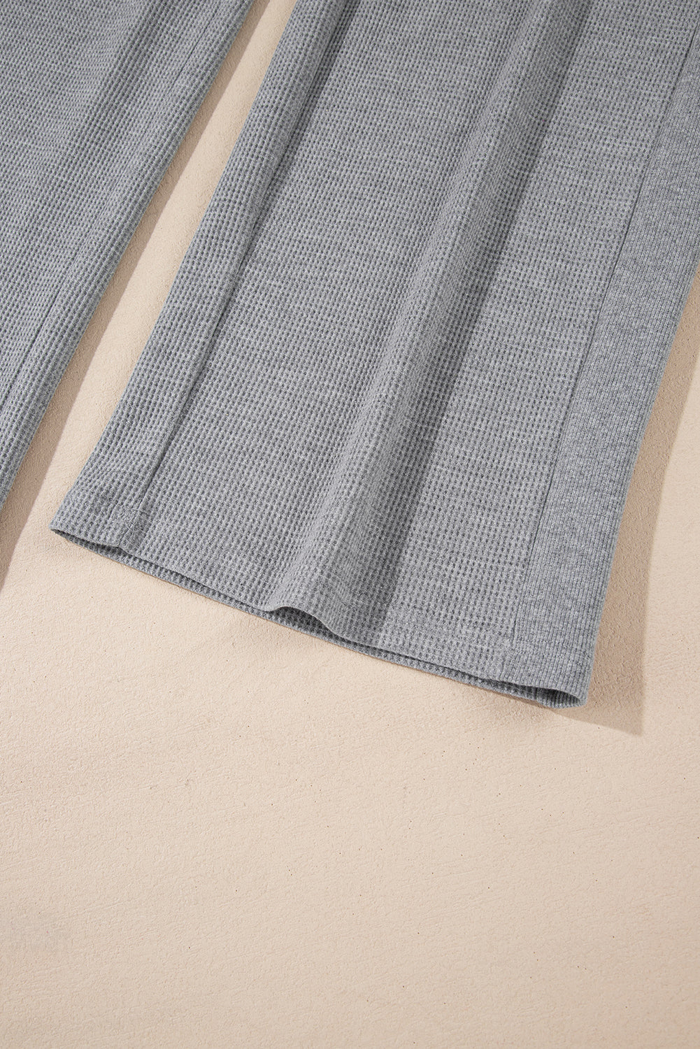 Pantalones anchos de cintura alta con cordón y punto waffle gris