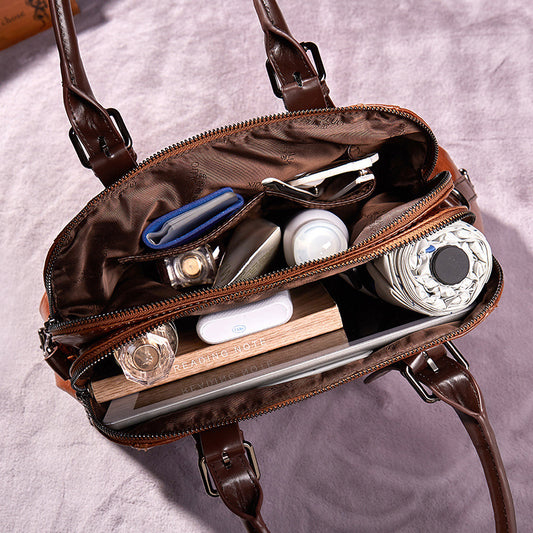 Bolsos de mano de piel para mujer