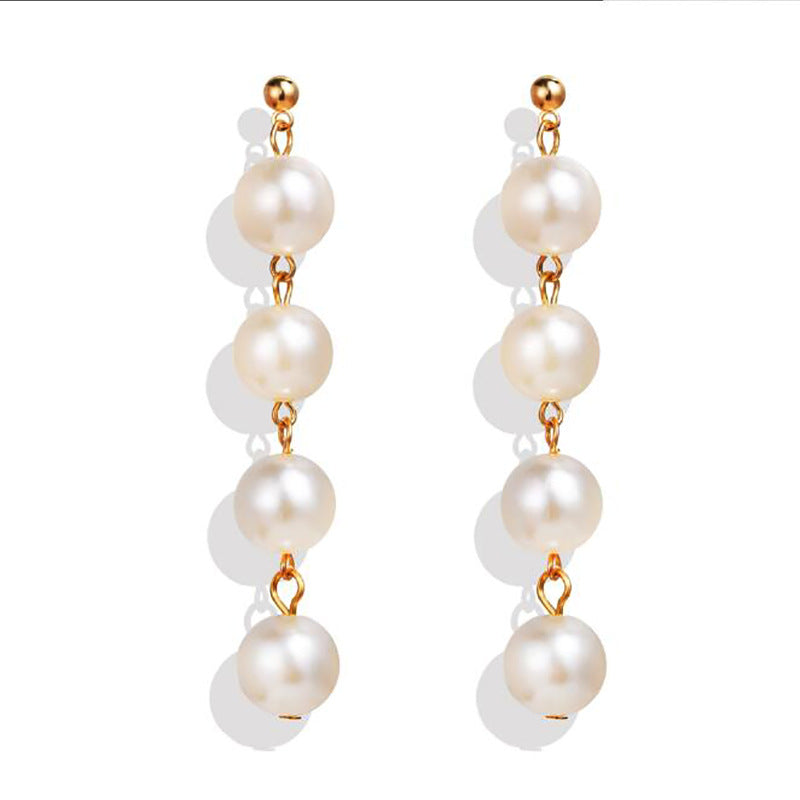 Pendientes largos de perla vintage sencillos