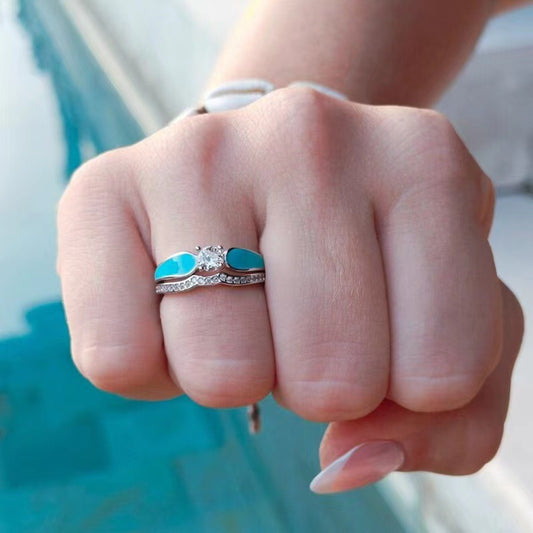 Anillo de mujer con dos piezas azules y diseño de ondas de diamantes