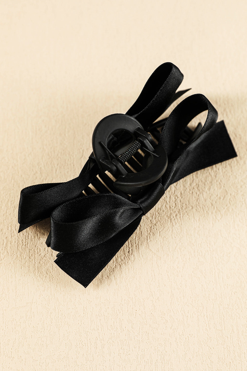 Pinza grande para el pelo con decoración de lazo negro