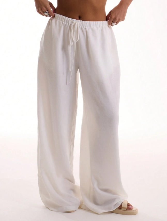 Pantalón con cintura anudada y tacto de lino texturizado