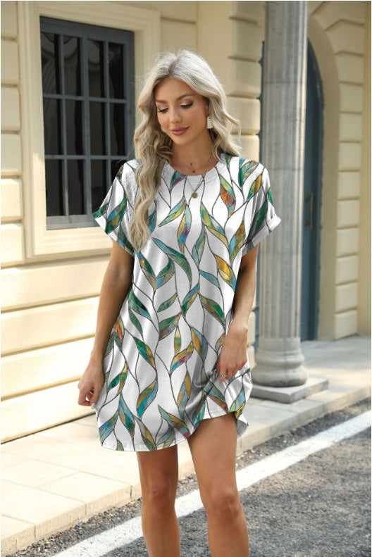 Vestido holgado de cuello redondo y manga corta estampado con bolsillos