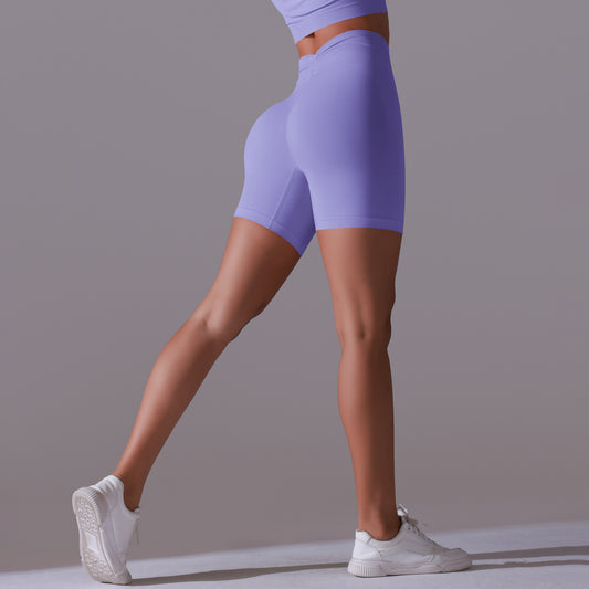 Leggings cortos deportivos de cintura alta transpirables elásticos y con efecto contracción abdominal