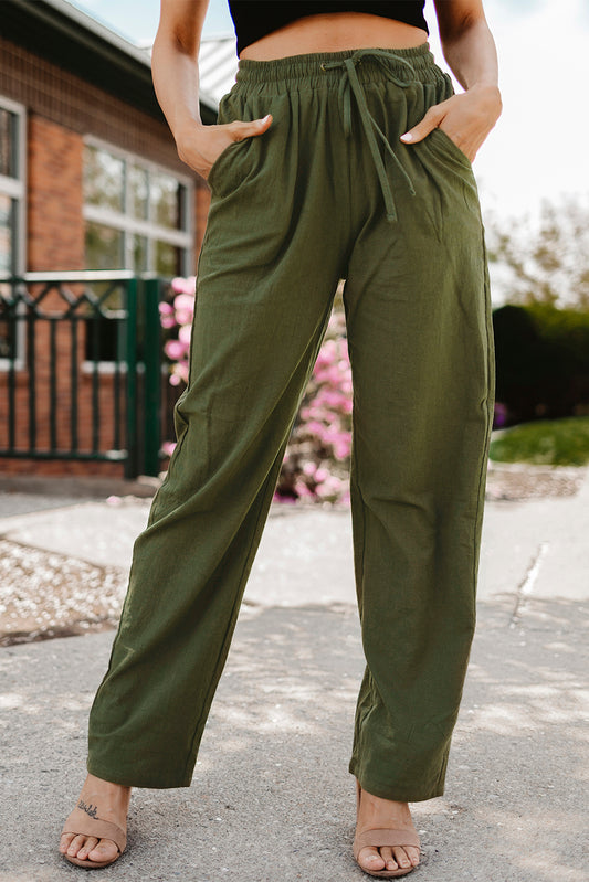Pantalones verdes con cordón elástico en la cintura bolsillos piernas largas y rectas