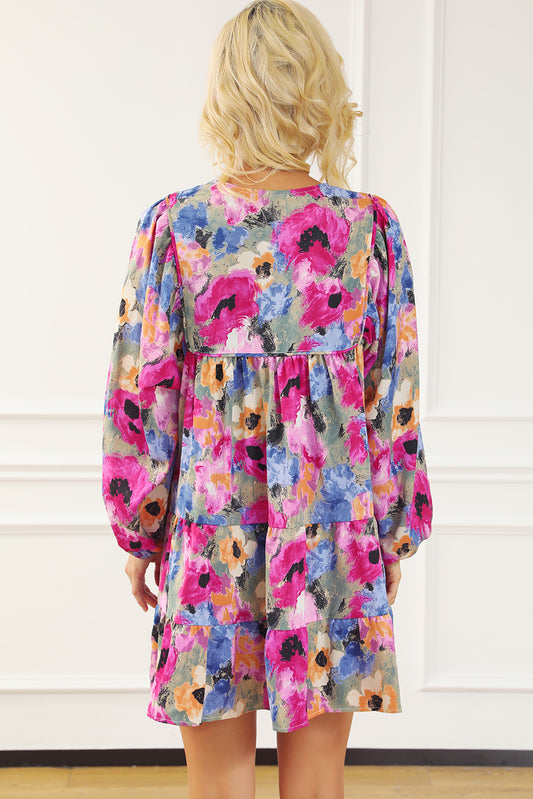 Vestido recto con mangas abullonadas y cuello anudado con flores multicolor
