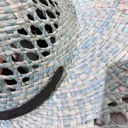 Sombrero de rafia con ala grande y borlas