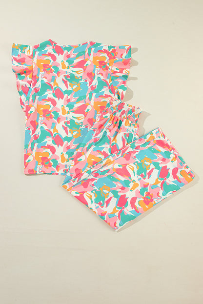 Conjunto de pantalones anchos y top con mangas con volantes florales