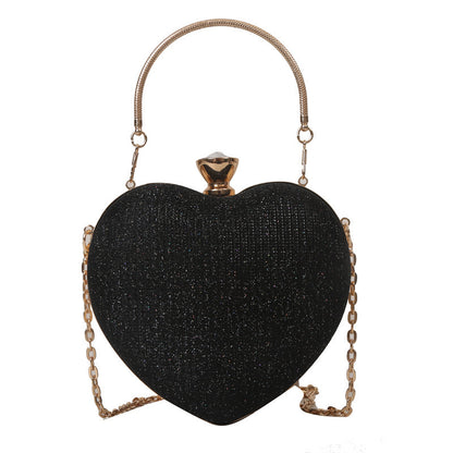 Bolso elegante de mujer con brillante en forma de corazón