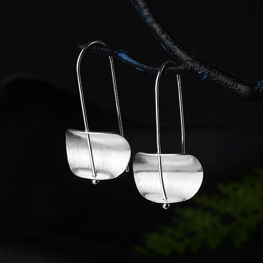 Pendientes creativos de moda para mujer con diseño cepillado