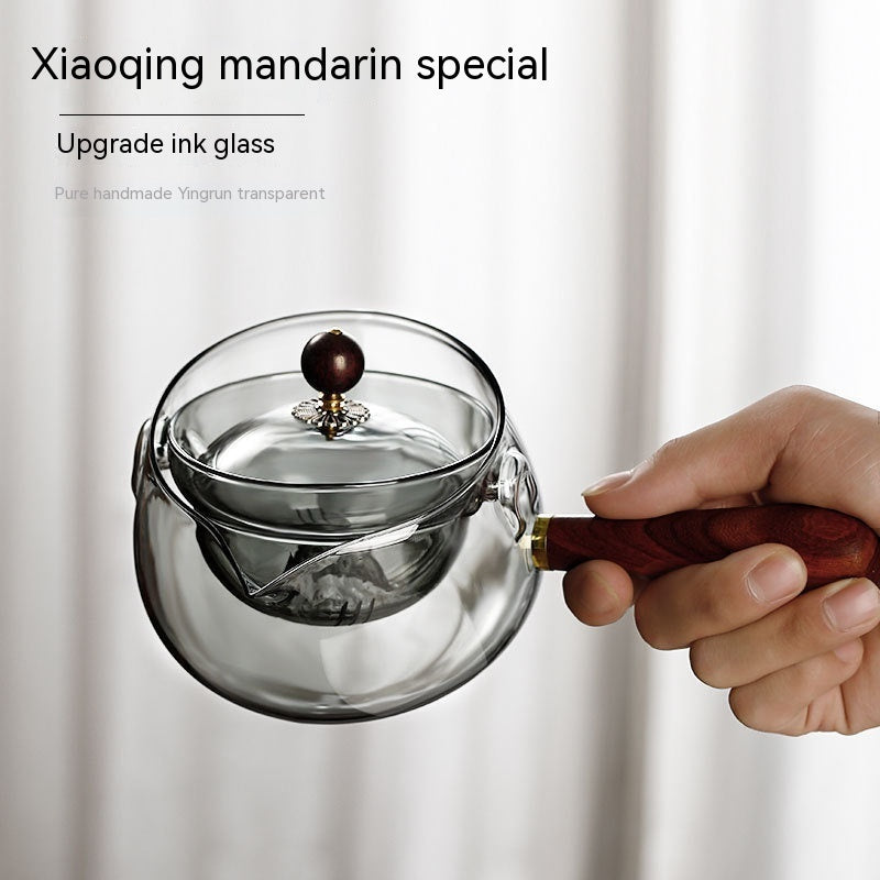 Durable glass tea pot with infuser and wooden handle
