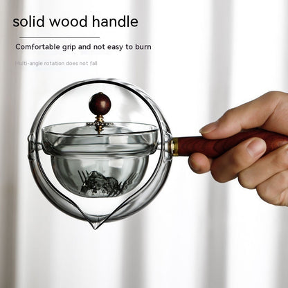 Durable glass tea pot with infuser and wooden handle