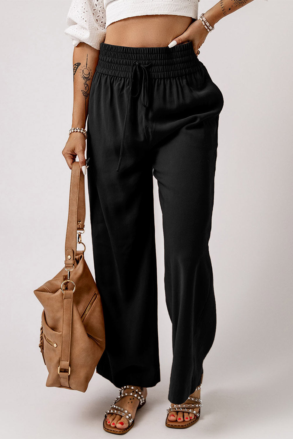 Pantalones anchos casuales con cintura elástica y cordón negro