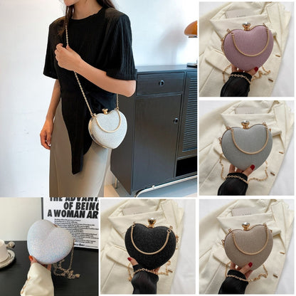 Bolso elegante de mujer con brillante en forma de corazón