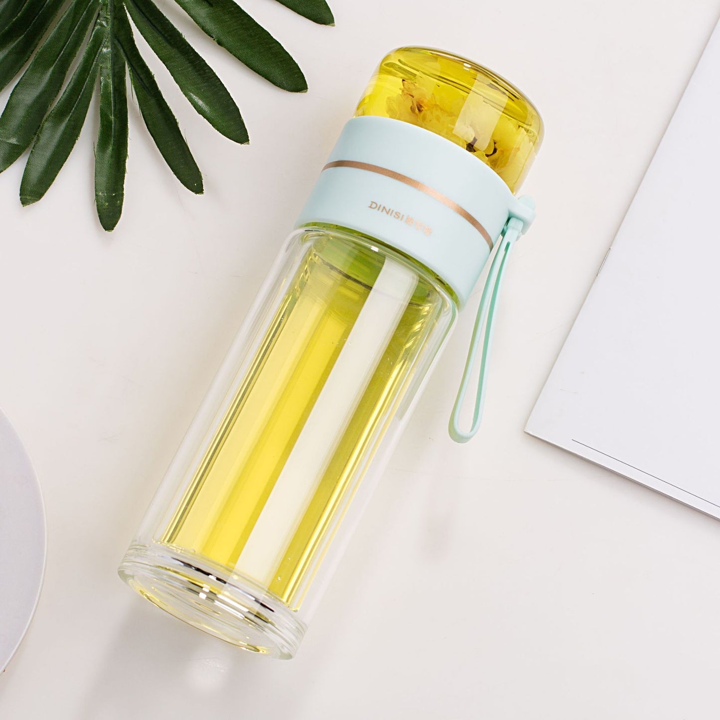 Glass water bottle with tea infuser filter