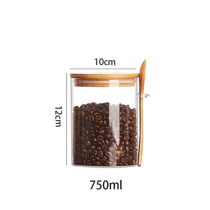 Set of glass containers with wooden spoon