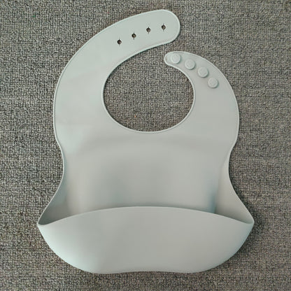 Babero de silicona suave impermeable con receptor de alimentos