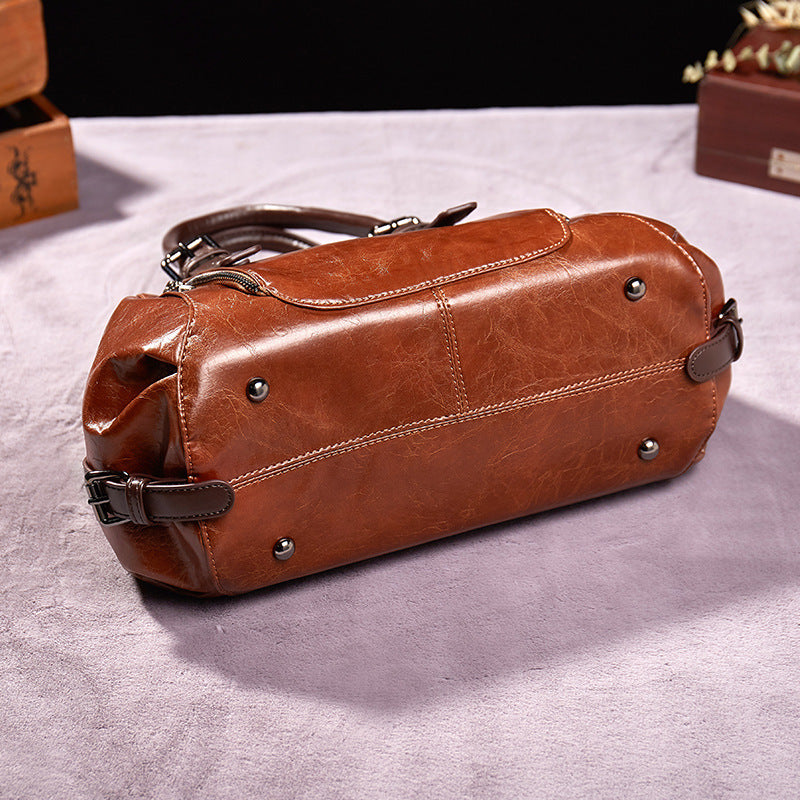 Bolsos de mano de piel para mujer