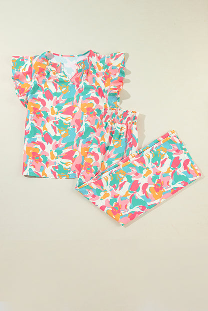 Conjunto de pantalones anchos y top con mangas con volantes florales