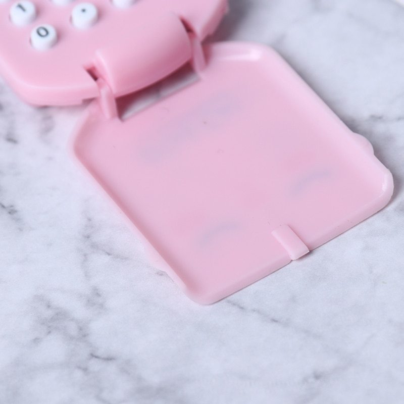 Mini calculadora en forma de galleta.