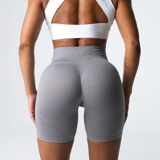 Legging cortos ajustados sin costuras para levantamiento de cadera y línea muscular de glúteos