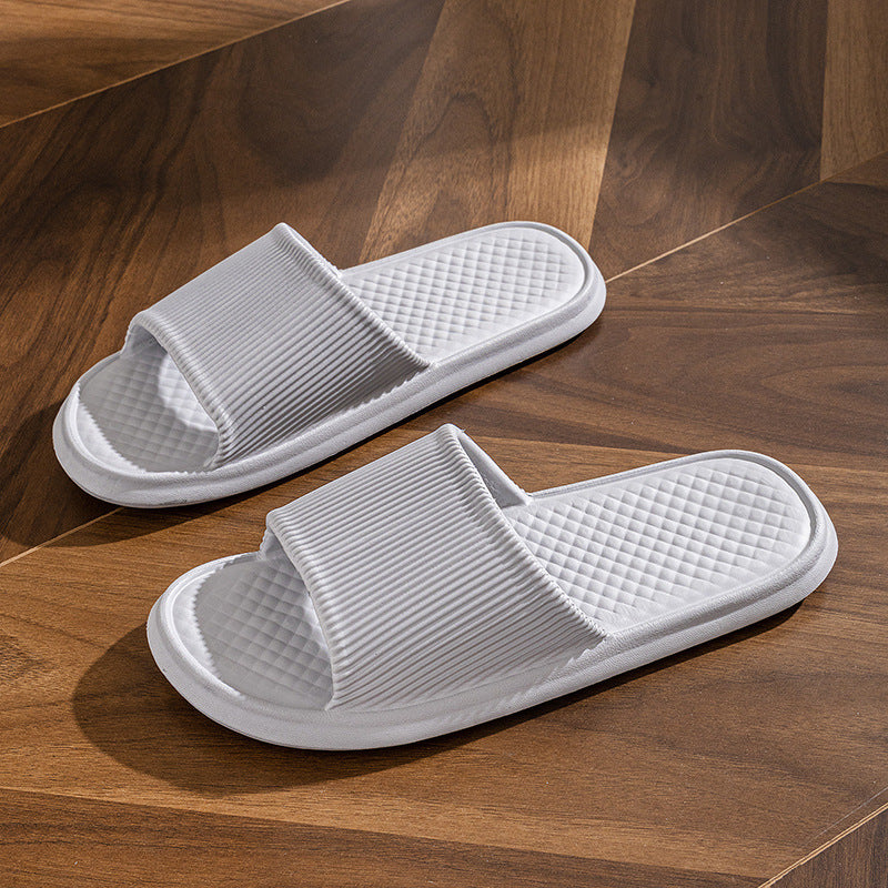 Solid-color summer flip-flops for men and women with non-slip diamond and stripe patterns.
