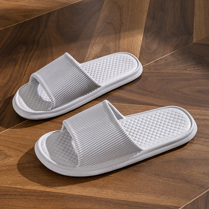 Solid-color summer flip-flops for men and women with non-slip diamond and stripe patterns.