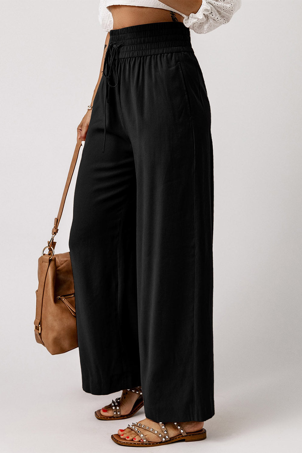 Pantalones anchos casuales con cintura elástica y cordón negro