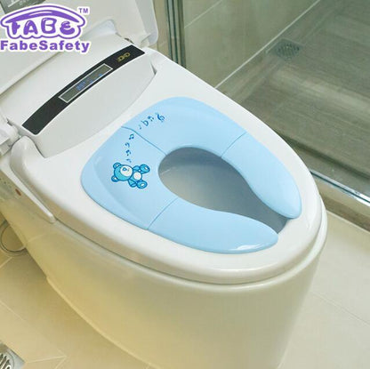 Folding toilet seat for children 