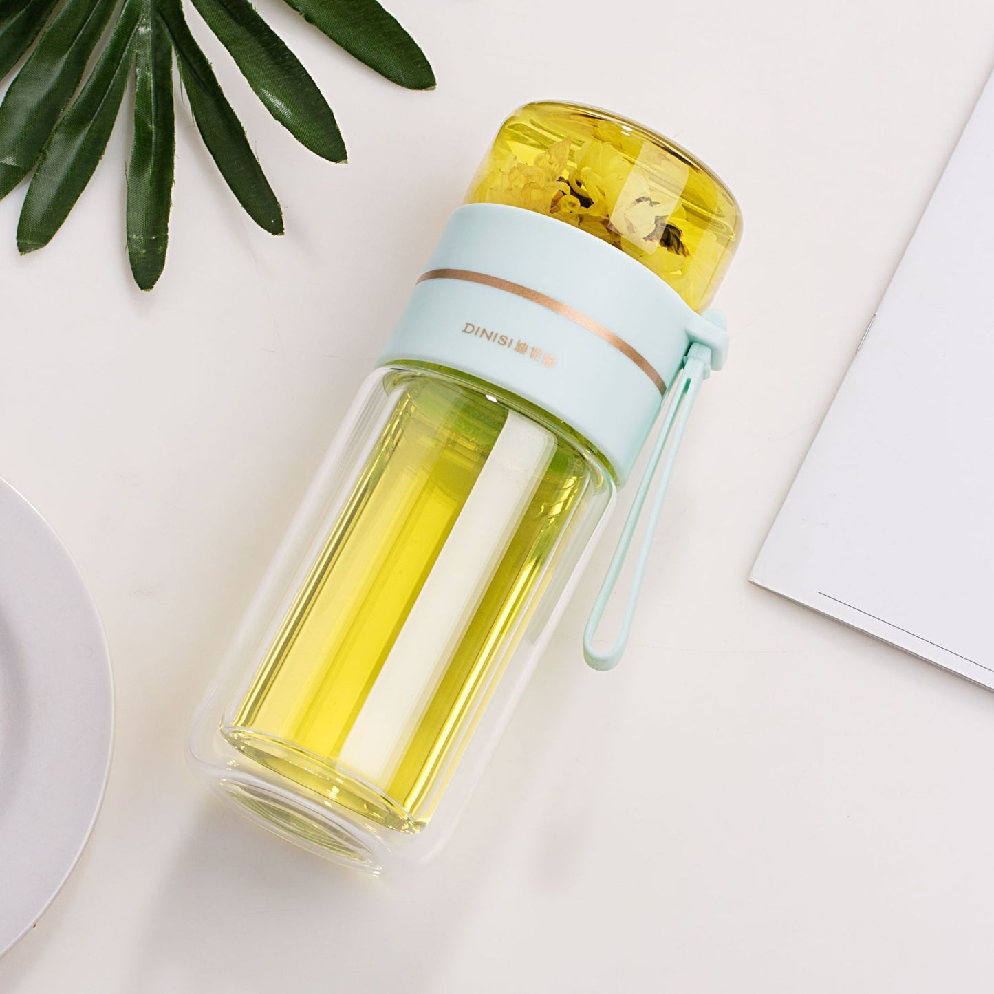 Glass water bottle with tea infuser filter