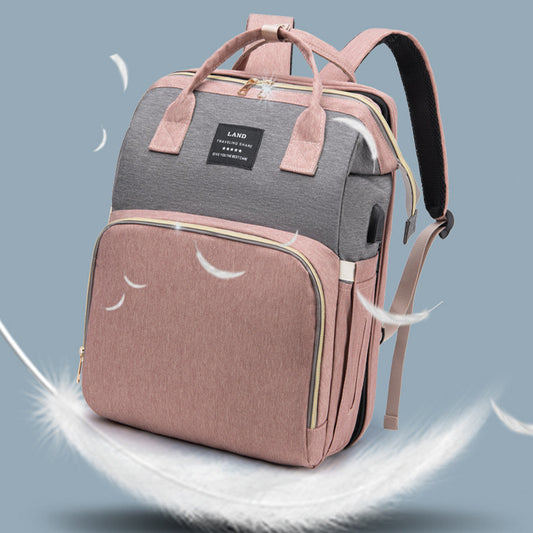 Mochila pañalera de bebe con cuna