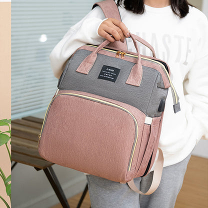 Baby diaper backpack with crib