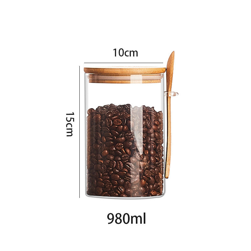 Set of glass containers with wooden spoon