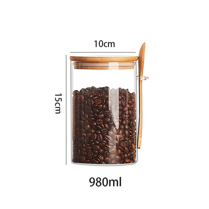 Set of glass containers with wooden spoon