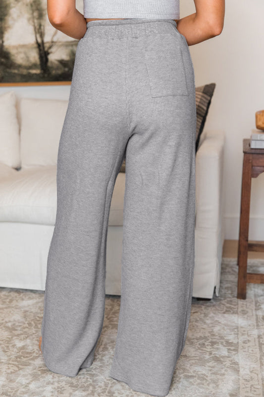 Pantalones anchos de cintura alta con cordón y punto waffle gris