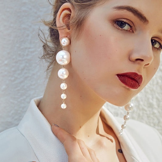 Pendientes largos de perla vintage sencillos