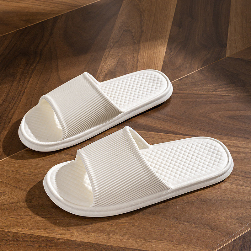 Solid-color summer flip-flops for men and women with non-slip diamond and stripe patterns.