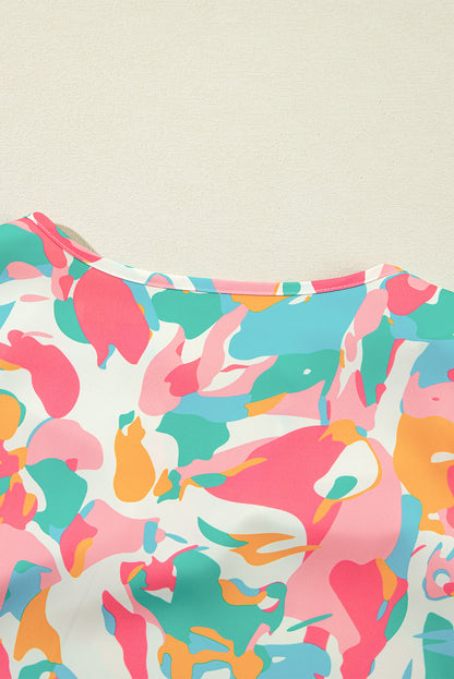 Conjunto de pantalones anchos y top con mangas con volantes florales
