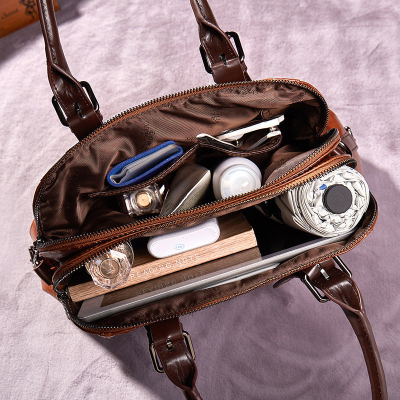 Bolsos de mano de piel para mujer