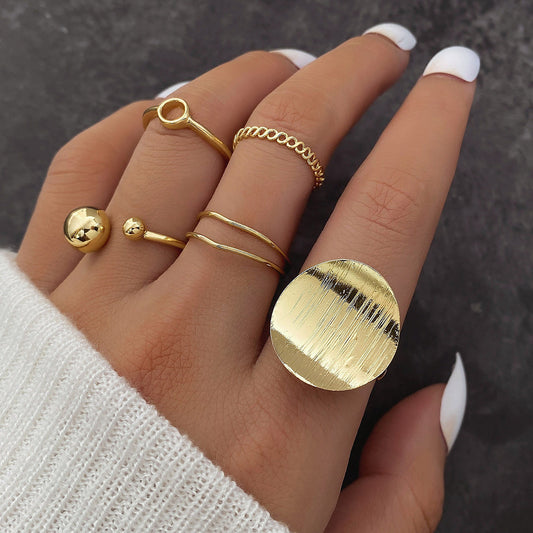 Juego de 5 anillos redondos con apertura ajustable