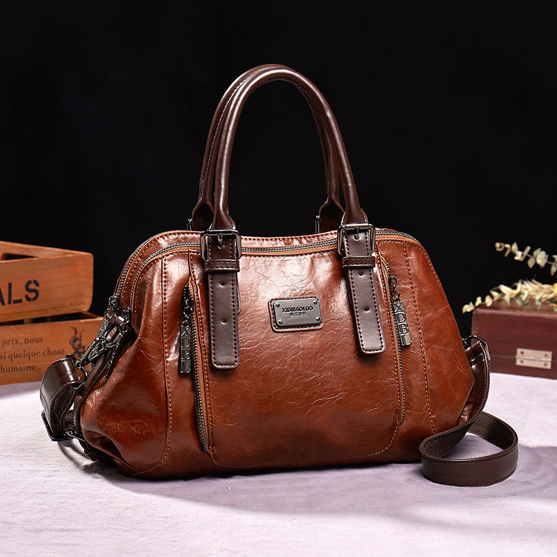 Bolsos de mano de piel para mujer