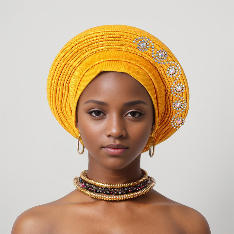 Turbante tiras laminadas de seda con brillantes