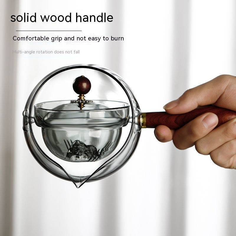 Durable glass tea pot with infuser and wooden handle