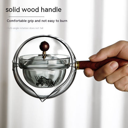 Durable glass tea pot with infuser and wooden handle