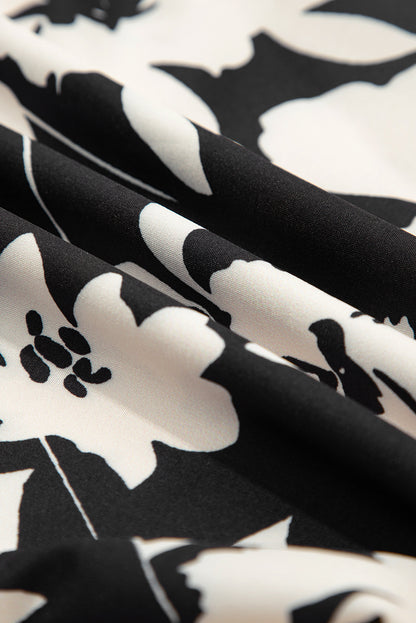 Pantalones anchos de cintura alta con fruncido y estampado floral negro