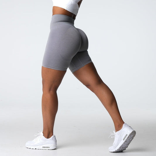 Legging cortos ajustados sin costuras para levantamiento de cadera y línea muscular de glúteos