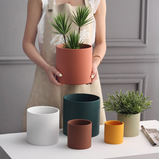 Maceta de cerámica colorida de estilo industrial forma cilíndrica